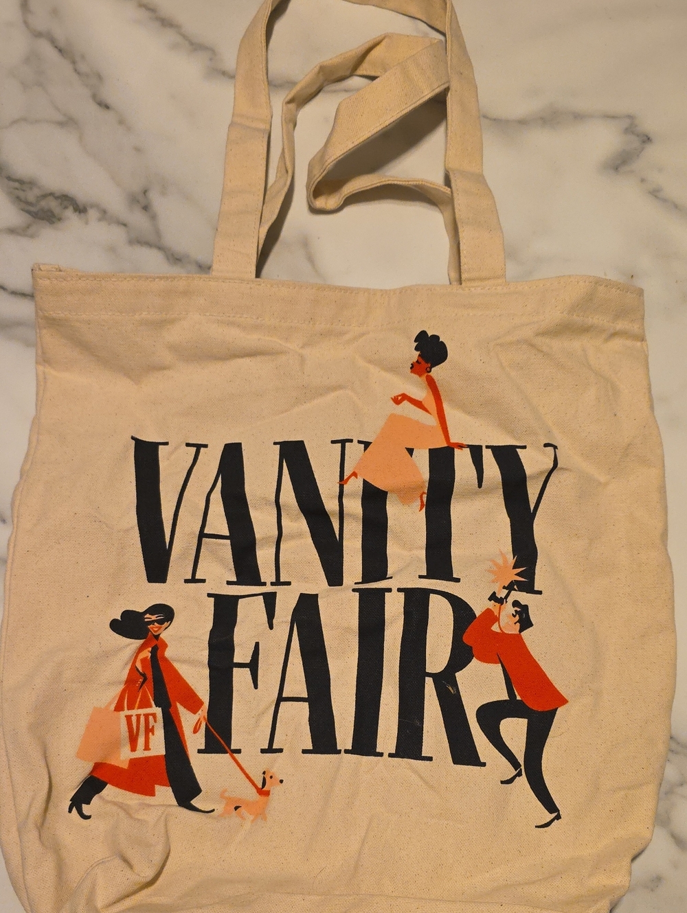 Vanity Fair Canvas Tote in Natural with Black and Orange Graphic
